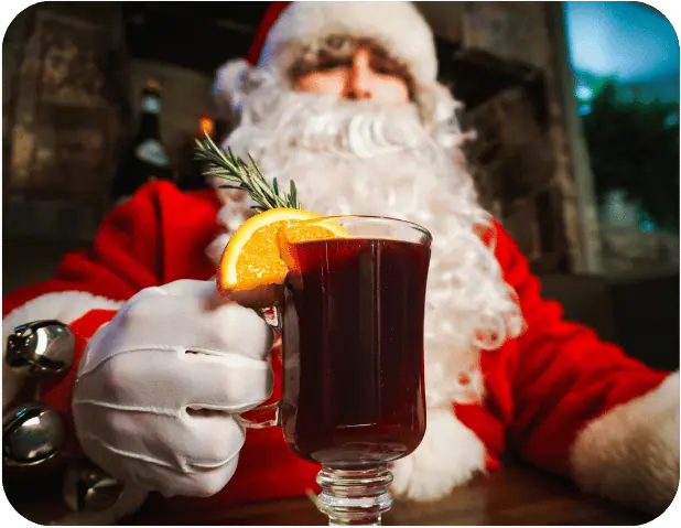 Père Noël avec vin chaud